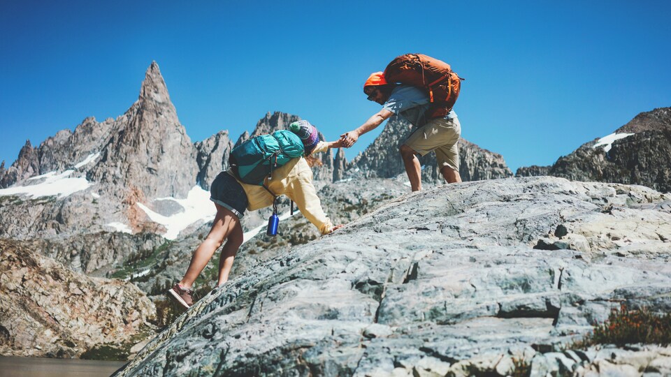 Men Carry Injured Hiker Down Mountain to Safety. 